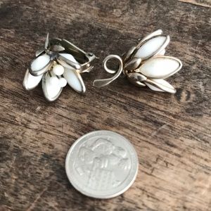 Vintage white Lilly clip on earrings.